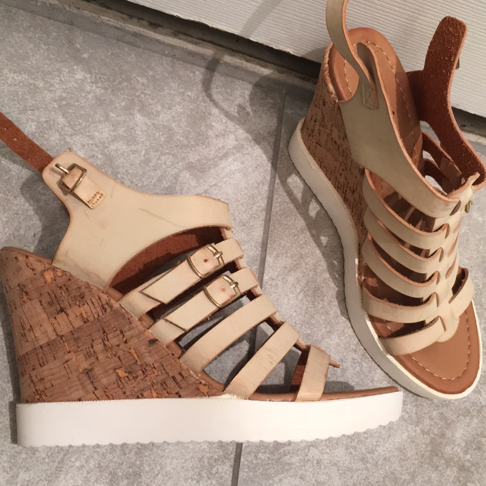 brand new!!! Never worn. Tan and white wedges